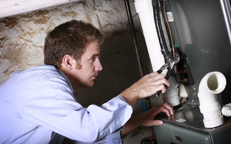 technician inspecting system